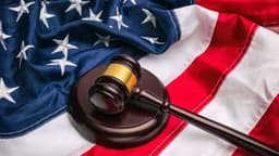 Coinbase CLO Argues Former SEC Crypto Stance Shares Similarities With US Tariffs Case